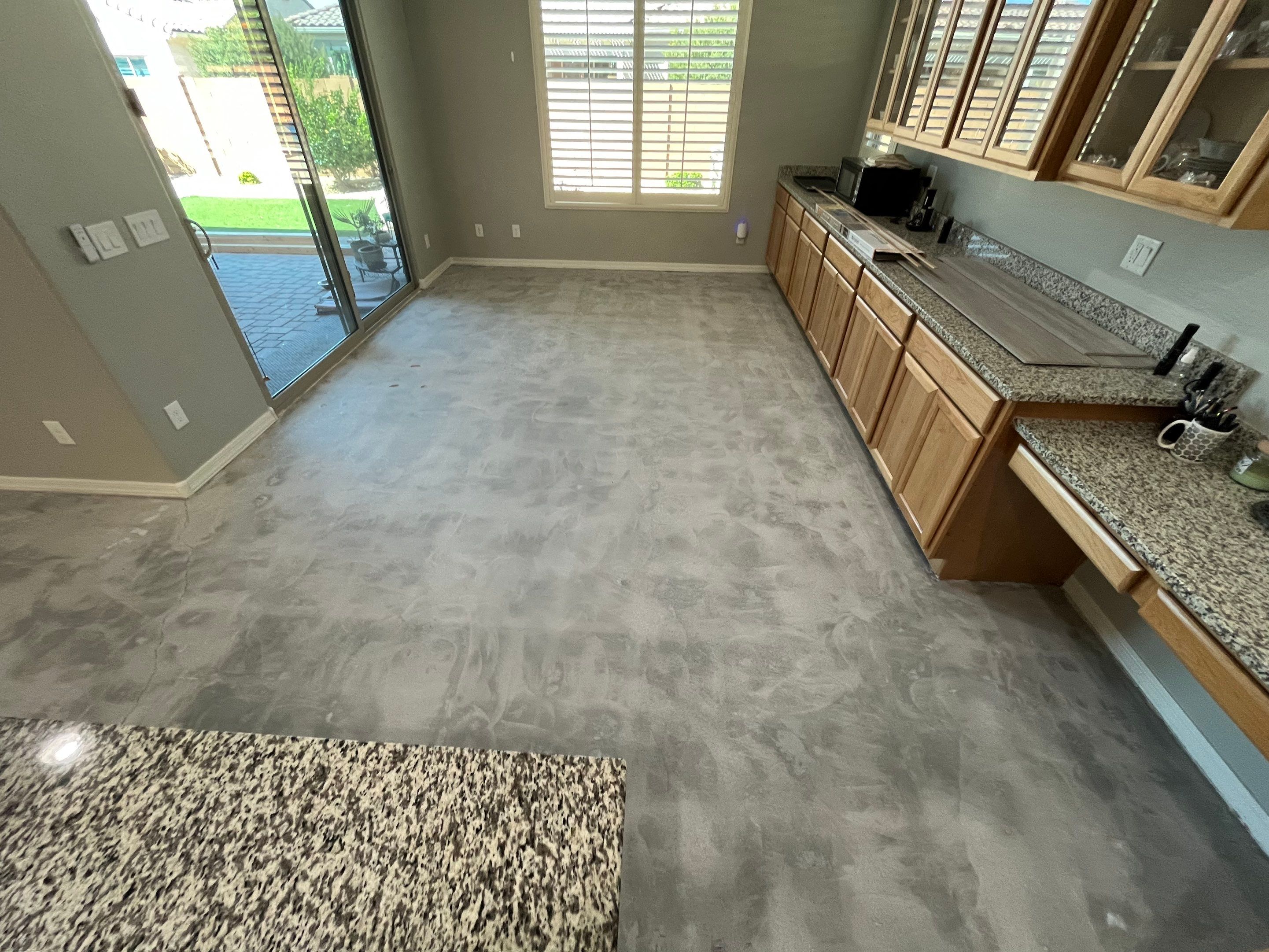 Finished kitchen with a clean concrete floor